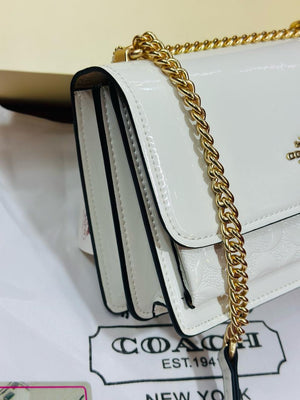 Klare Crossbody In Signature Patent